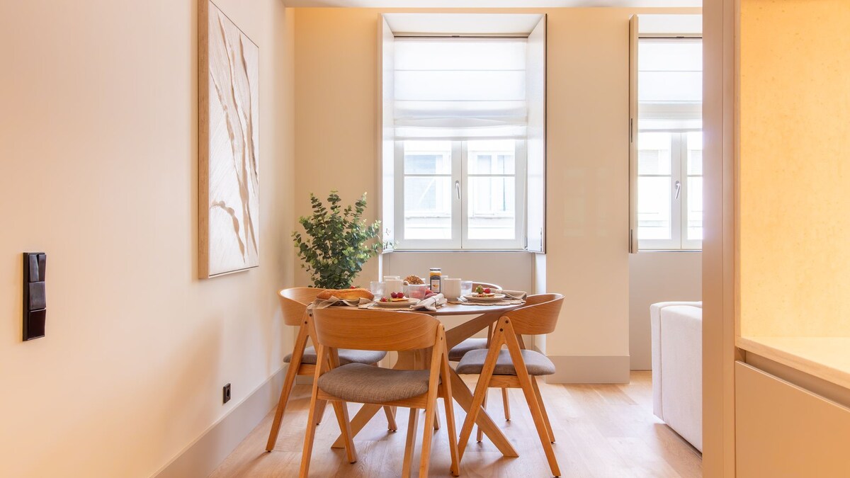 Dining area with street-facing windows